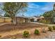 Charming single-story home with a tidy front yard and colorful flower accents at 309 W Campbell Ave, Phoenix, AZ 85013