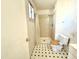 Bathroom featuring a shower with a curtain and classic tiling at 3133 N 81St Ave, Phoenix, AZ 85033