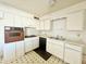 Vintage kitchen featuring bright white cabinets, and efficient appliances at 3133 N 81St Ave, Phoenix, AZ 85033