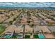 Aerial view of a residential area highlighting homes with pools and well-maintained landscaping in a suburban neighborhood at 3712 S 104Th Ln, Tolleson, AZ 85353