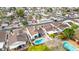 Aerial view of a neighborhood showcasing lush landscaping and a community pool at 406 W Fellars Dr, Phoenix, AZ 85023