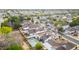 Expansive aerial view of a residential neighborhood with a community pool and well-maintained landscaping at 406 W Fellars Dr, Phoenix, AZ 85023