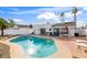 Relaxing pool area with inviting lounge chairs, a barbecue grill, and a refreshing pool at 406 W Fellars Dr, Phoenix, AZ 85023