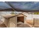 Enclosed backyard shed providing ample outdoor storage with a shaded area for convenient use at 4116 W Milada Dr, Laveen, AZ 85339