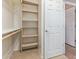 Walk-in closet features built in shelving and rack for maximum storage capacity at 4116 W Milada Dr, Laveen, AZ 85339