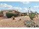 Well-kept single-story home featuring desert landscaping, mature plants, and plenty of curb appeal at 6217 W Orange Dr, Glendale, AZ 85301