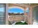 A detailed shot of a balcony, featuring two chairs and a view of the community at 7418 E Sandia Cir, Mesa, AZ 85207