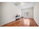 Empty bedroom with lots of natural light and hardwood floors at 7418 E Sandia Cir, Mesa, AZ 85207