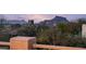 Expansive mountain views surround the private desert property with mature trees and vegetation at 7418 E Sandia Cir, Mesa, AZ 85207