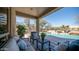 Outdoor living space with a pool and lounge chairs perfect for relaxation and entertaining at 7418 E Sandia Cir, Mesa, AZ 85207