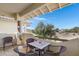 Relaxing covered balcony with seating and golf course views, great for enjoying the outdoors at 9100 E Raintree Dr # 209, Scottsdale, AZ 85260