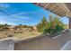 Outdoor balcony provides a great view of the lush landscape and a nearby golf course at 9100 E Raintree Dr # 209, Scottsdale, AZ 85260