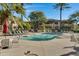 Community pool area surrounded by lounge chairs, inviting relaxation and socializing at 9100 E Raintree Dr # 209, Scottsdale, AZ 85260