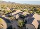 Aerial view of the neighborhood highlighting manicured landscaping and beautiful homes at 9435 E Mohawk Ln, Scottsdale, AZ 85255