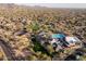 Aerial view of the community featuring pool, tennis court, and community center at 9435 E Mohawk Ln, Scottsdale, AZ 85255