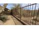 Backyard desert landscaping with secure fencing at 9435 E Mohawk Ln, Scottsdale, AZ 85255