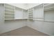 Walk-in closet with built-in shelving for maximum storage and organization at 9435 E Mohawk Ln, Scottsdale, AZ 85255