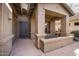 Inviting front porch with a decorative door and covered entrance at 9435 E Mohawk Ln, Scottsdale, AZ 85255