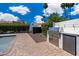 Outdoor kitchen featuring built-in grill and refrigerator, perfect for outdoor cooking and entertaining next to the pool at 9675 E Cinnabar Ave, Scottsdale, AZ 85258