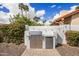 Outdoor kitchen featuring a stainless steel grill and mini fridge at 9675 E Cinnabar Ave, Scottsdale, AZ 85258