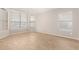 Cozy bedroom featuring tile floors, neutral paint and plenty of natural light at 10012 W Runion Dr, Peoria, AZ 85382