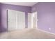 Bedroom featuring a large closet with doors and a view into another room at 10012 W Runion Dr, Peoria, AZ 85382