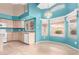 Eat-in kitchen with natural light and a view of the backyard at 10012 W Runion Dr, Peoria, AZ 85382