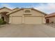 This home features a spacious driveway and a 2-car garage at 10012 W Runion Dr, Peoria, AZ 85382