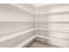 Bright and spacious walk-in pantry with plenty of shelving at 10012 W Runion Dr, Peoria, AZ 85382