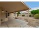 Covered patio area extending into the backyard, offering outdoor living space at 10012 W Runion Dr, Peoria, AZ 85382