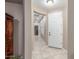 Inviting entryway featuring neutral paint, light tile floors, and an open sight line at 1197 W Rolls Rd, San Tan Valley, AZ 85143