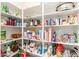 Well-organized pantry with ample shelving for food storage and kitchen essentials at 1197 W Rolls Rd, San Tan Valley, AZ 85143