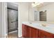 Bathroom features a double sink vanity and enclosed shower at 1209 N 87Th St, Scottsdale, AZ 85257