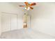 Bedroom with neutral paint, plush carpet, and a spacious closet at 1209 N 87Th St, Scottsdale, AZ 85257