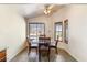 Cozy breakfast nook with a glass table, seating for four, and natural lighting at 1209 N 87Th St, Scottsdale, AZ 85257
