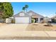 Charming single-story home featuring a two-car garage, desert landscaping, and a neutral color palette at 1209 N 87Th St, Scottsdale, AZ 85257