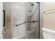 Modern shower design with sleek glass door and tiled walls at 1209 N 87Th St, Scottsdale, AZ 85257