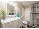 Bright bathroom featuring marble counters and a shower-tub combo at 12438 N Saguaro Blvd # 108, Fountain Hills, AZ 85268