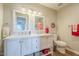 Well-lit bathroom featuring a dual sink vanity and modern fixtures at 12438 N Saguaro Blvd # 108, Fountain Hills, AZ 85268