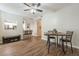Open dining area with modern table and chairs, adjacent to the kitchen at 12438 N Saguaro Blvd # 108, Fountain Hills, AZ 85268