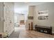 Inviting entryway with a view into the living room with fireplace at 12438 N Saguaro Blvd # 108, Fountain Hills, AZ 85268