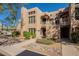 Charming townhouse featuring well-maintained landscaping and a welcoming entrance at 12438 N Saguaro Blvd # 108, Fountain Hills, AZ 85268
