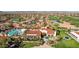 Beautiful aerial shot of the community center, golf course, and pool at 12915 W Micheltorena Dr, Sun City West, AZ 85375