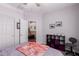 Bedroom with closet and views of the hallway to the main house at 13331 W Romain Ct, Litchfield Park, AZ 85340