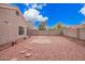 Backyard featuring desert landscaping, creating a serene and low-maintenance space at 14106 N 127Th Ave, El Mirage, AZ 85335