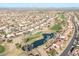 This is an aerial view of a beautiful golf course community, complete with a scenic pond at 14218 W Via Montoya --, Sun City West, AZ 85375
