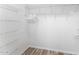 Walk-in closet features wire shelving and rod for ample storage at 14218 W Via Montoya --, Sun City West, AZ 85375
