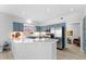 Modern kitchen featuring stainless steel appliances, ample counter space, updated blue cabinetry, and recessed lighting at 14218 W Via Montoya --, Sun City West, AZ 85375