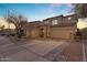 Inviting two-story home featuring a spacious driveway and attached two-car garage at 14875 W Larkspur Dr, Surprise, AZ 85379