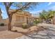 Two-story home featuring xeriscaping with rocks and desert plants at 14875 W Larkspur Dr, Surprise, AZ 85379